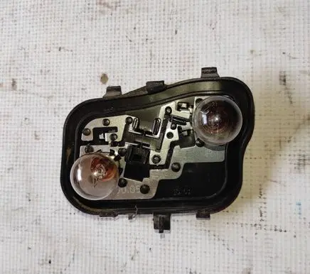 Mitsubishi Colt Tail light bulb cover holder 27852201