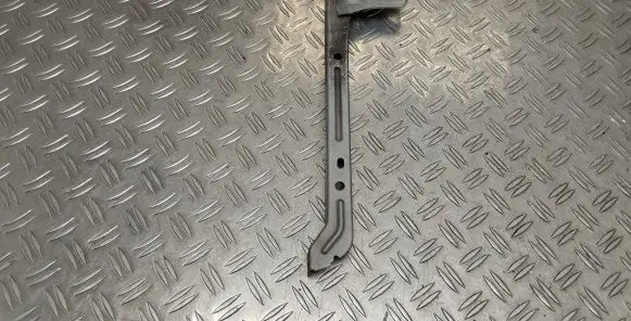 Radiator support slam panel bracket