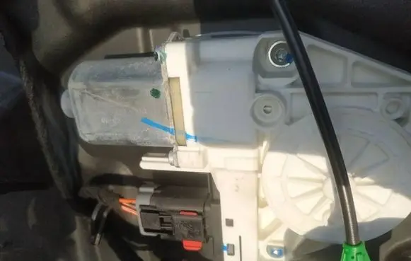 Front door window regulator motor