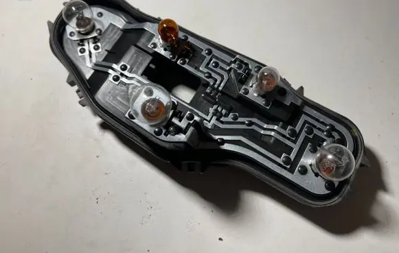 Volkswagen e-Up Tail light bulb cover holder 1S0945258