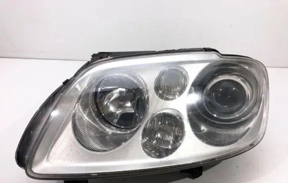 Volkswagen Touran I Headlight/headlamp 1T0941031K