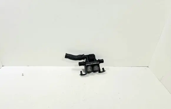 Coolant heater control valve