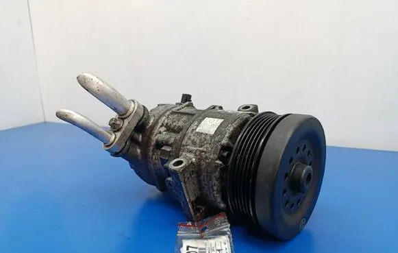 Opel Corsa D Air conditioning (A/C) compressor (pump) 55701200