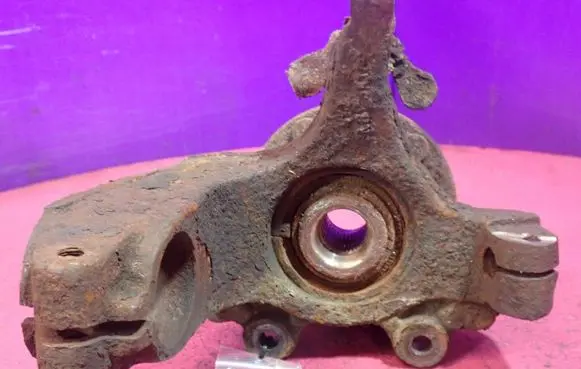Front wheel hub spindle knuckle