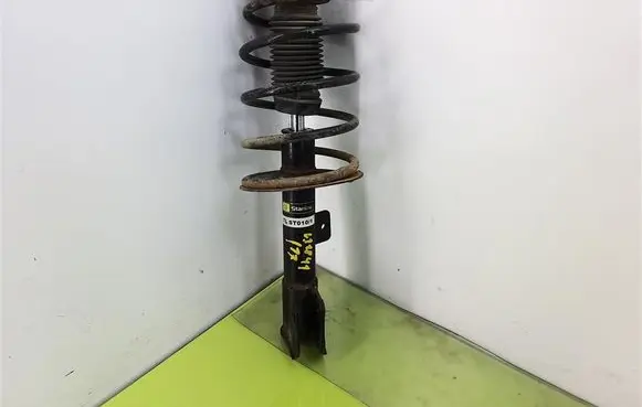 Front shock absorber with coil spring