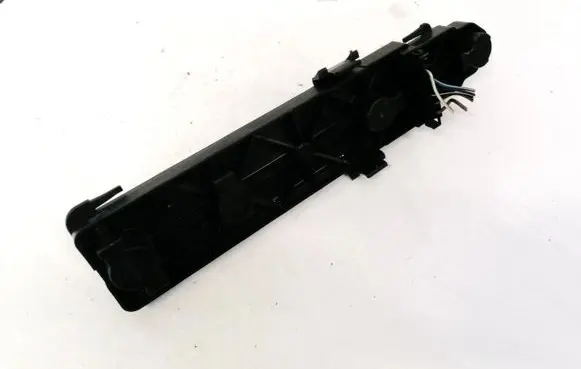 Tail light bulb cover holder