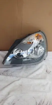 Renault Clio II Headlight/headlamp 7701057654