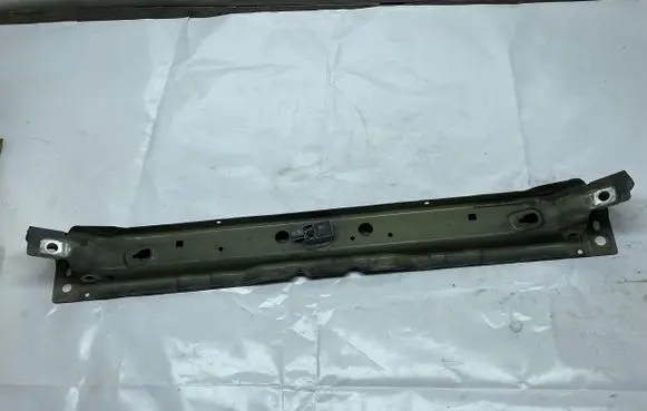 Top upper radiator support slam panel