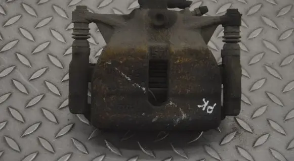 Volkswagen Golf VII Front brake caliper