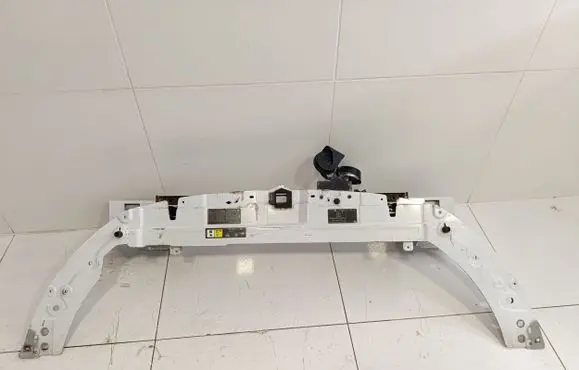 Top upper radiator support slam panel