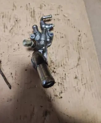 Thermostat/thermostat housing