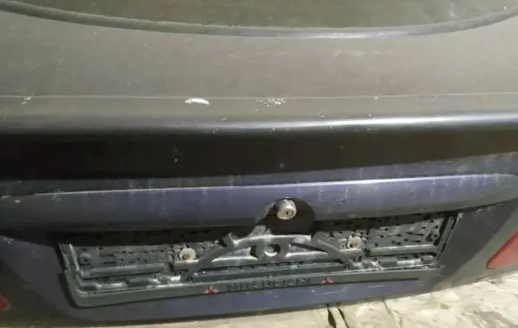 Mitsubishi Carisma Trunk door license plate light bar 