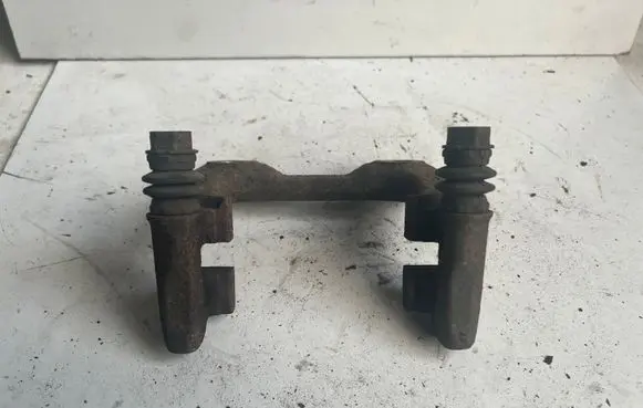 Volkswagen Golf V Brake caliper pad carrier rear 1K0615425P