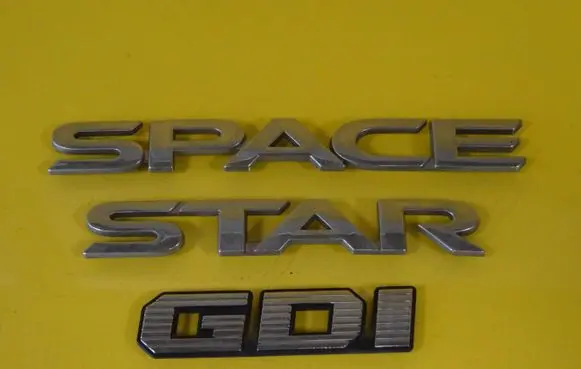 Mitsubishi Space Star Manufacturers badge/model letters 