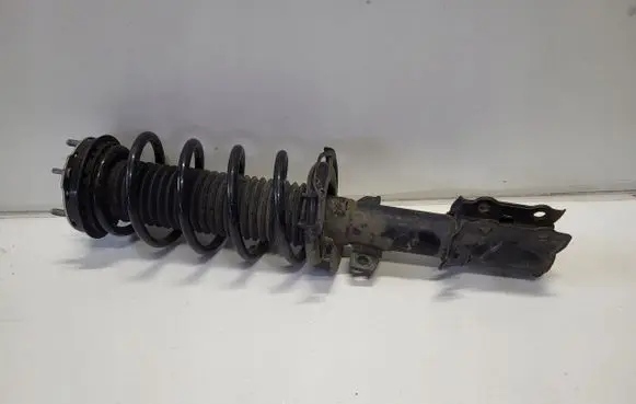 Ford Fiesta Front shock absorber with coil spring H1BC18045AC