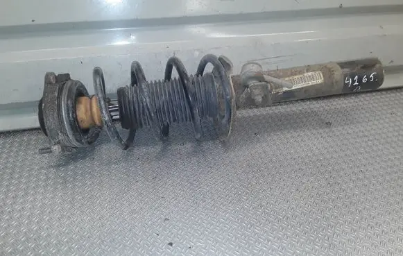 Volkswagen Golf VI Front shock absorber with coil spring 