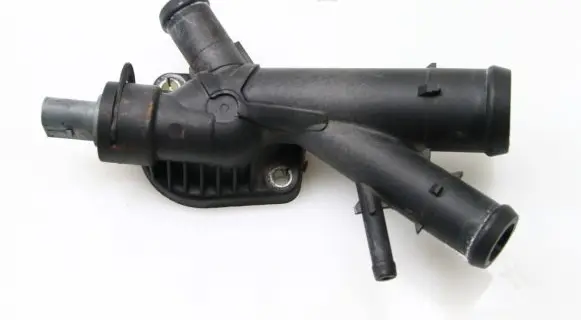 Thermostat/thermostat housing