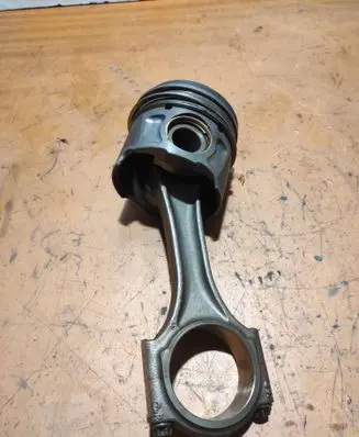 Piston with connecting rod