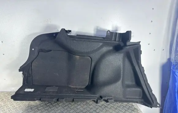 Trunk/boot lower side trim panel