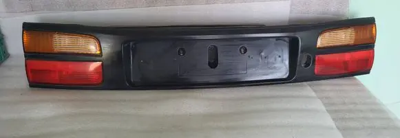 Renault Laguna I Trunk door license plate light bar 7700420119 2334