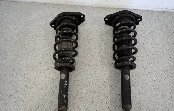 Nissan Primera Front shock absorber with coil spring