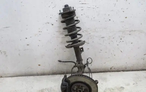 KIA Carens III Front wheel hub spindle knuckle GMAUTO4574097