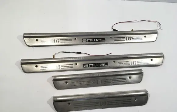 Mitsubishi L200 sill trim set (inner) MR117822 K607 MR117821