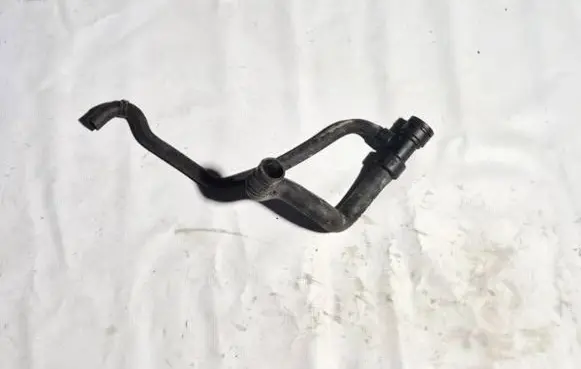Volkswagen PASSAT B5 Engine coolant pipe/hose 8d0121055f