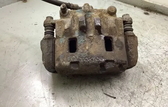 Subaru Forester SH Front brake caliper
