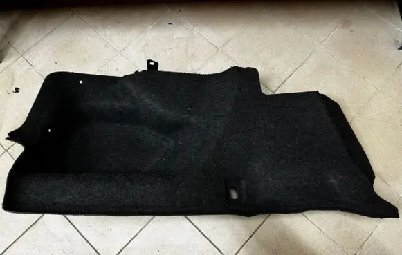 Trunk/boot lower side trim panel