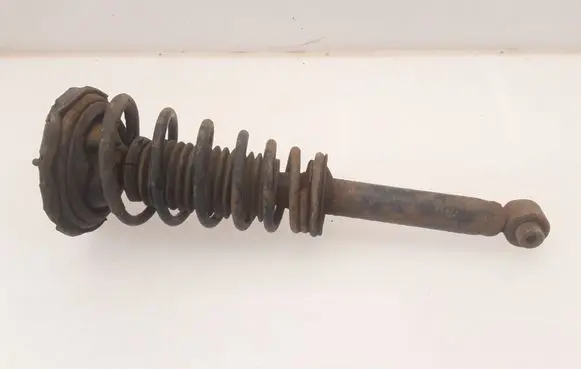 Nissan Primera Front shock absorber with coil spring
