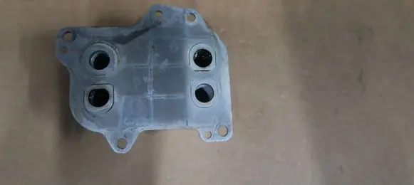Skoda Octavia Mk3 (5E) Oil filter mounting bracket 03N117021