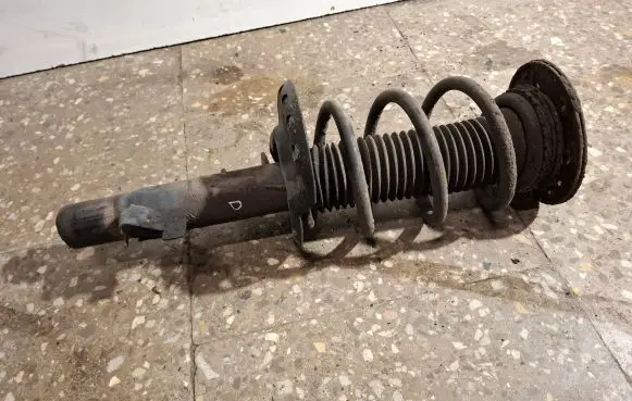 Front shock absorber with coil spring