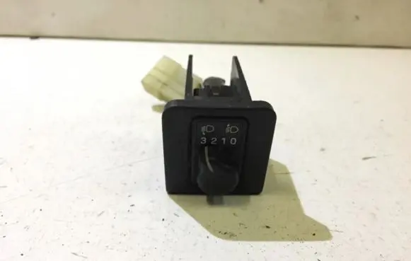 Subaru Impreza I Headlight level height control switch