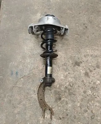 Front shock absorber with coil spring