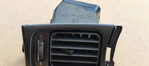 Subaru Impreza III Dashboard side air vent grill/cover trim 66110FG010