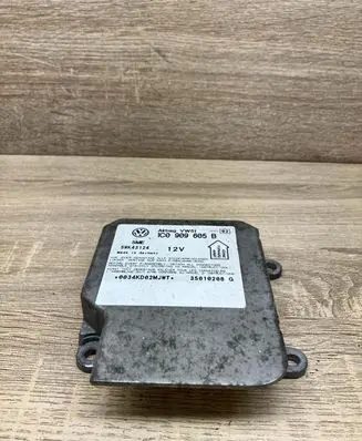 Volkswagen PASSAT B5 Airbag control unit/module 1C0909605B 5WK43124