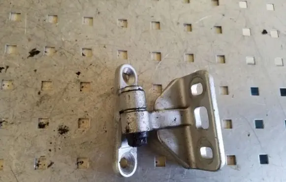 Rear door upper hinge
