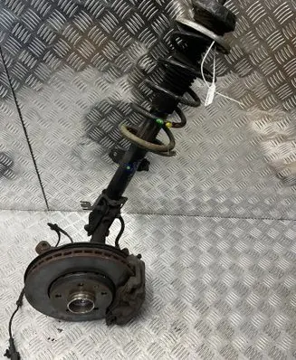 Dacia Duster II Front shock absorber with coil spring