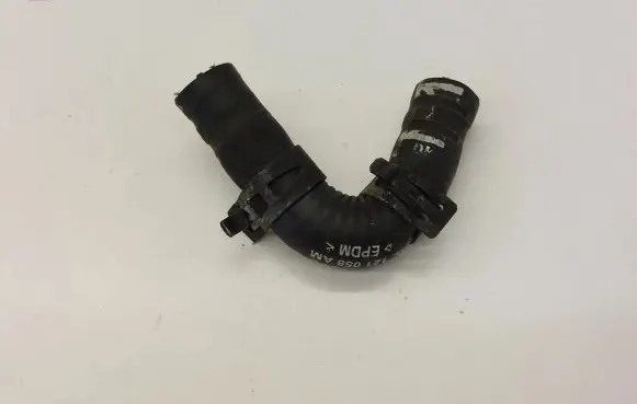 Volkswagen PASSAT B8 Engine coolant pipe/hose 04L121058AM