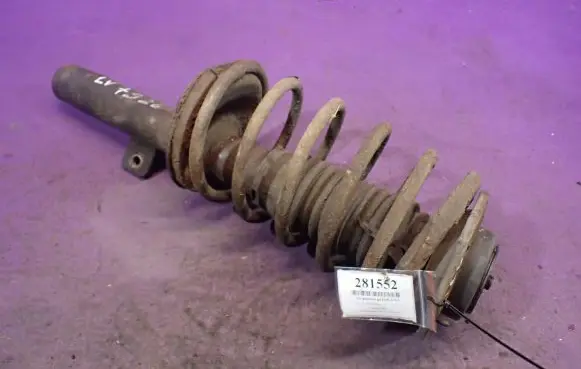 Citroen Berlingo Front shock absorber with coil spring