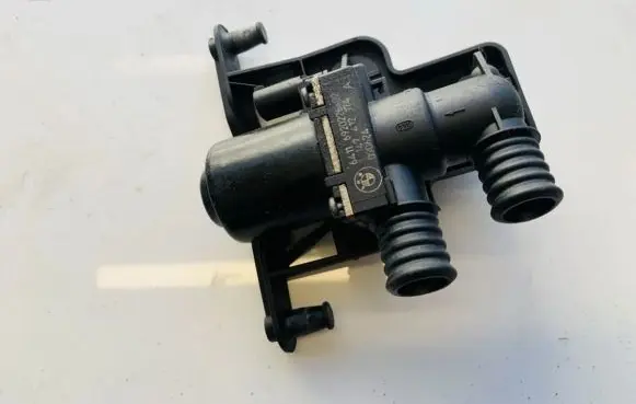 Coolant heater control valve