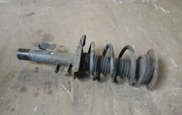 Volvo V60 Front shock absorber with coil spring 31360101