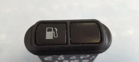 KIA Sedona Fuel tank opening switch 