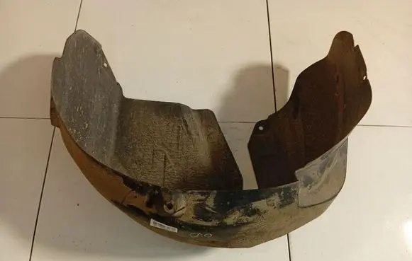 Nissan Note (E11) Rear arch fender liner splash guards 767489U00A