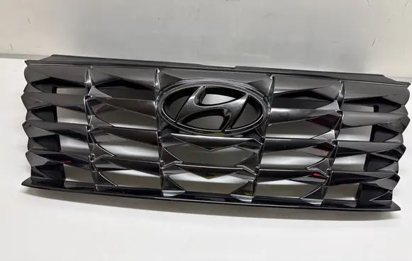 Hyundai Tucson IV NX4 Front bumper upper radiator grill 86391N7000