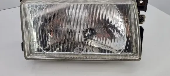 Volkswagen Polo II 86C 2F Headlight/headlamp 303137548