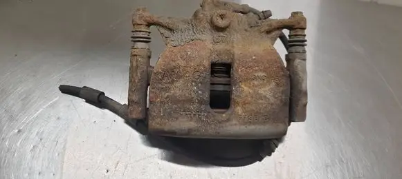 Volkswagen Golf VII Front brake caliper 6798C