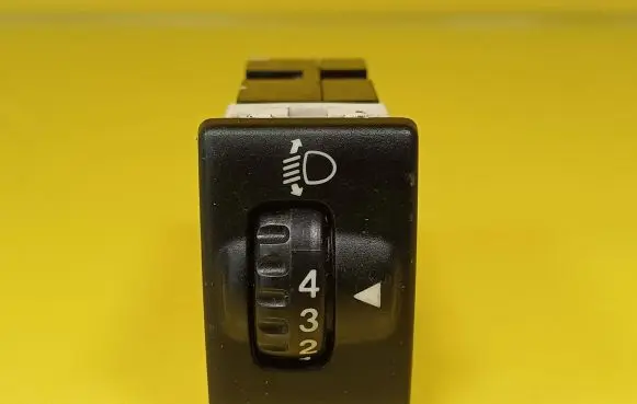 Headlight level height control switch