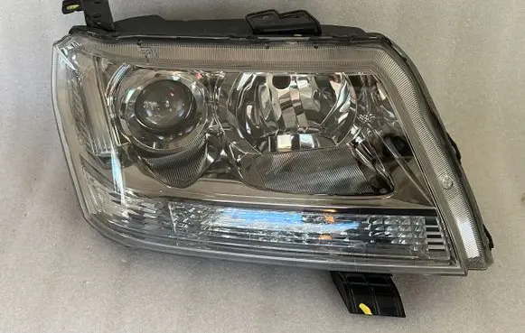 Suzuki Grand Vitara II Headlight/headlamp 10059079 100590883